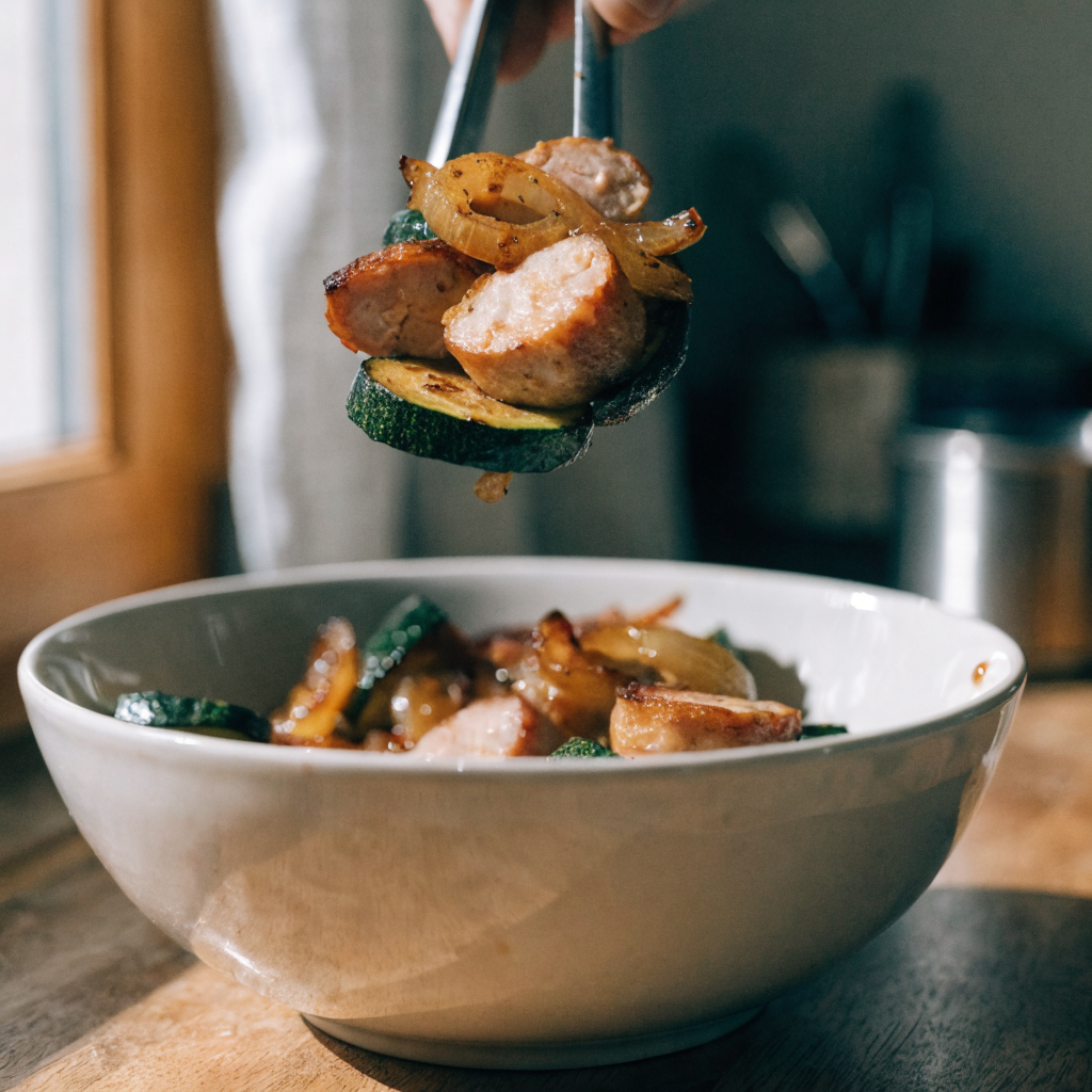 Close-up of 10-minute air fryer chicken sausage and veggies