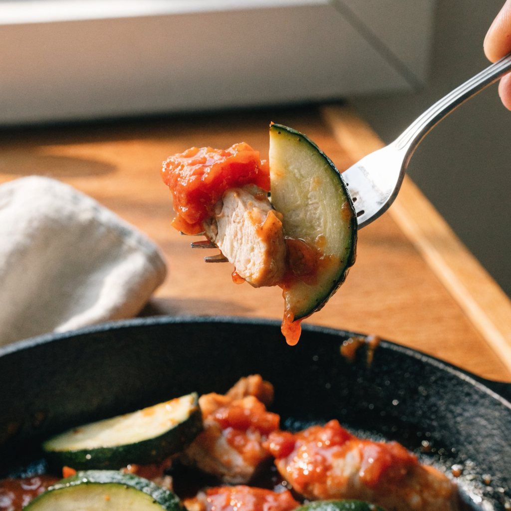 Close-up of skillet tex mex chicken and zucchini