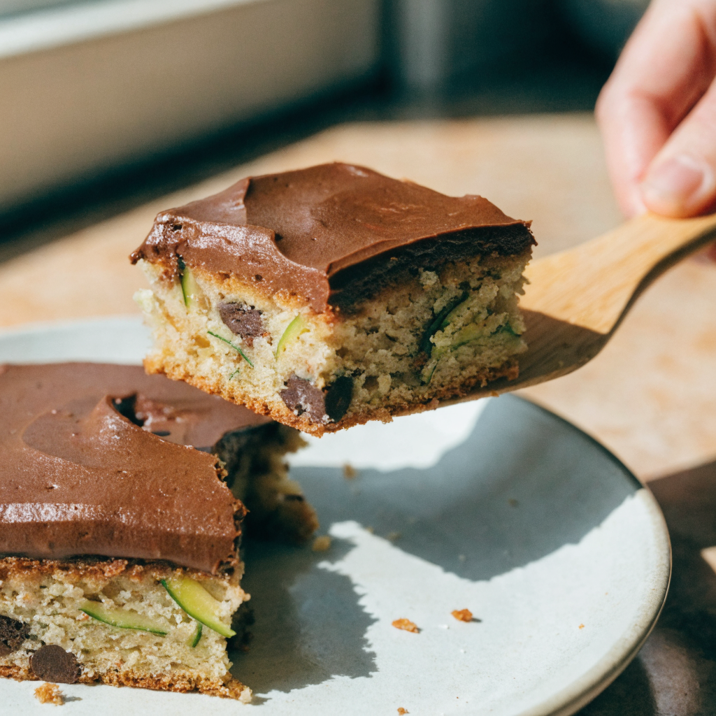 Close-up of zucchini brownies with peanut-butter chocolate frosting